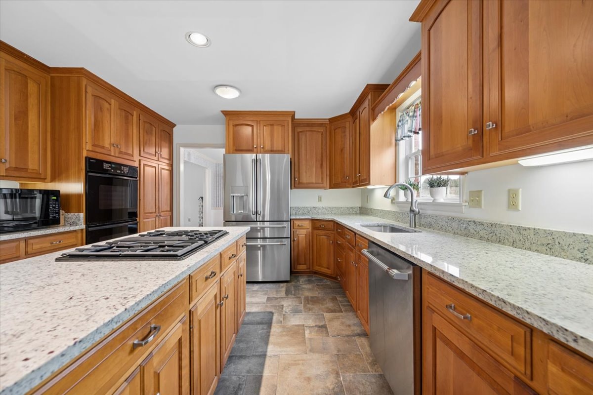 Gourmet kitchen with luxury finishes and center island